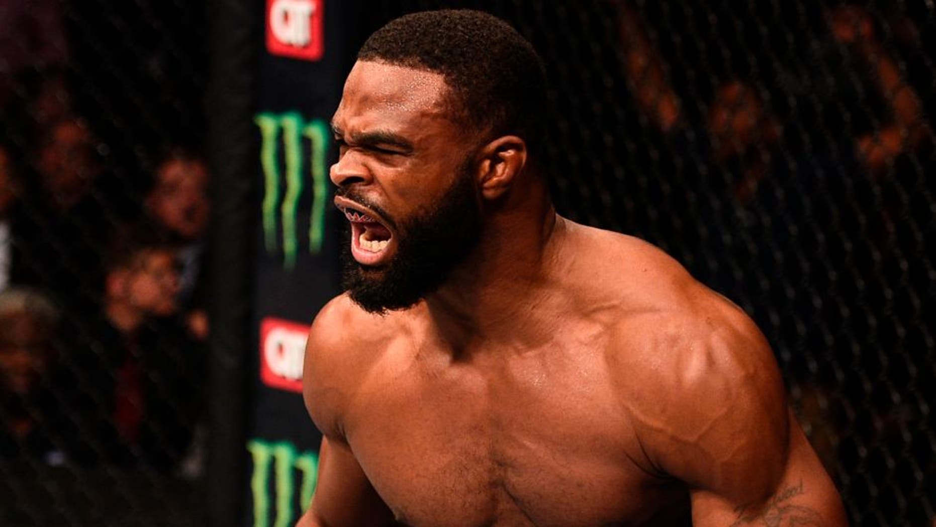 ATLANTA, GA - JULY 30: Tyron Woodley celebrates after knocking out Robbie Lawler in their welterweight championship bout during the UFC 201 event on July 30, 2016 at Philips Arena in Atlanta, Georgia. (Photo by Jeff Bottari/Zuffa LLC/Zuffa LLC via Getty Images)