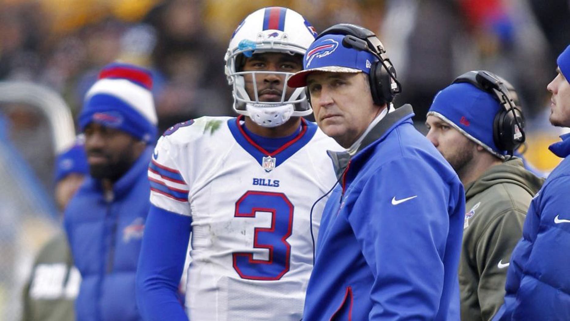 Nov 10, 2013; Pittsburgh, PA, USA; Buffalo Bills quarterback EJ Manuel (3) and Buffalo Bills head coach Doug Marrone (right) watch a scoreboard replay against the Pittsburgh Steelers during the fourth quarter at Heinz Field. The Pittsburgh Steelers won 23-10. Mandatory Credit: Charles LeClaire-USA TODAY Sports