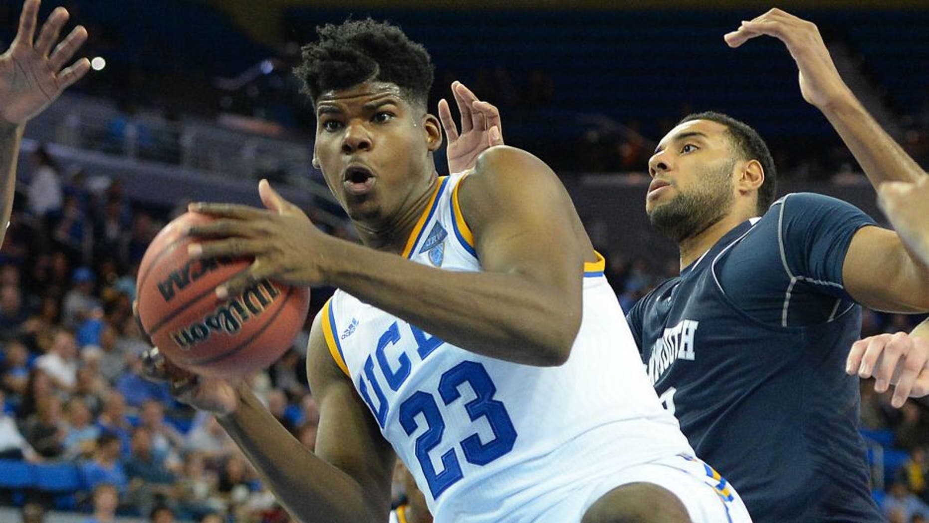 Nov 13, 2015; Los Angeles, CA, USA; UCLA Bruins forward Tony Parker (23) grabs a rebound in the second half of the game against the Monmouth Hawks at Pauley Pavilion. Monmouth won 84-81 in overtime. Mandatory Credit: Jayne Kamin-Oncea-USA TODAY Sports