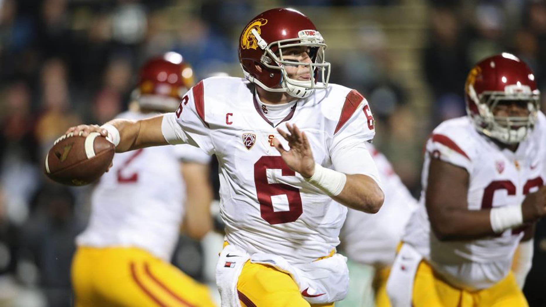 Nov 13, 2015; Boulder, CO, USA; USC Trojans quarterback Cody Kessler (6) looks to pass the ball during the first half against the Colorado Buffaloes at Folsom Field. Mandatory Credit: Chris Humphreys-USA TODAY Sports