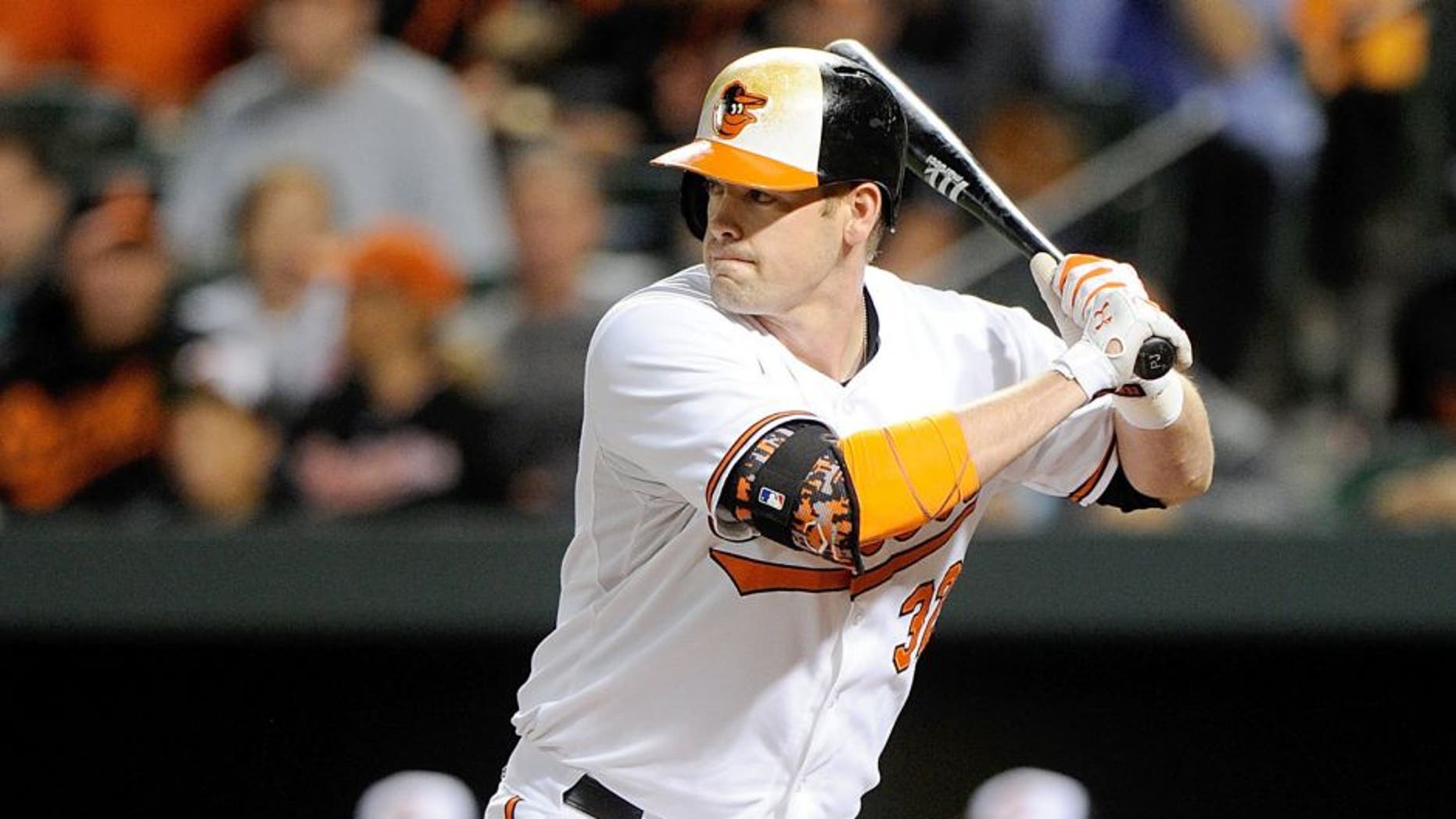 BALTIMORE, MD - SEPTEMBER 13: Matt Wieters #32 of the Baltimore Orioles bats against the Kansas City Royals at Oriole Park at Camden Yards on September 13, 2015 in Baltimore, Maryland. (Photo by G Fiume/Getty Images)