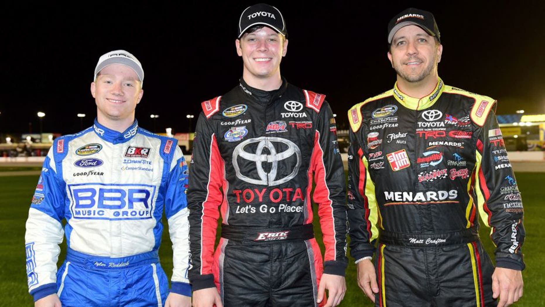 FORT WORTH, TX - NOVEMBER 06: (L-R) NASCAR Camping World Truck Series championship contenders Tyler Reddick, driver of the #19 Stoney Creek Records Ford, Erik Jones, driver of the #4 Toyota, and Matt Crafton, driver of the #88 Damp Rid/Menards Toyota, pose for a photograph prior to the NASCAR Camping World Truck Series WinStar World Casino 350 at Texas Motor Speedway on November 6, 2015 in Fort Worth, Texas. (Photo by Jared C. Tilton/NASCAR via Getty Images)