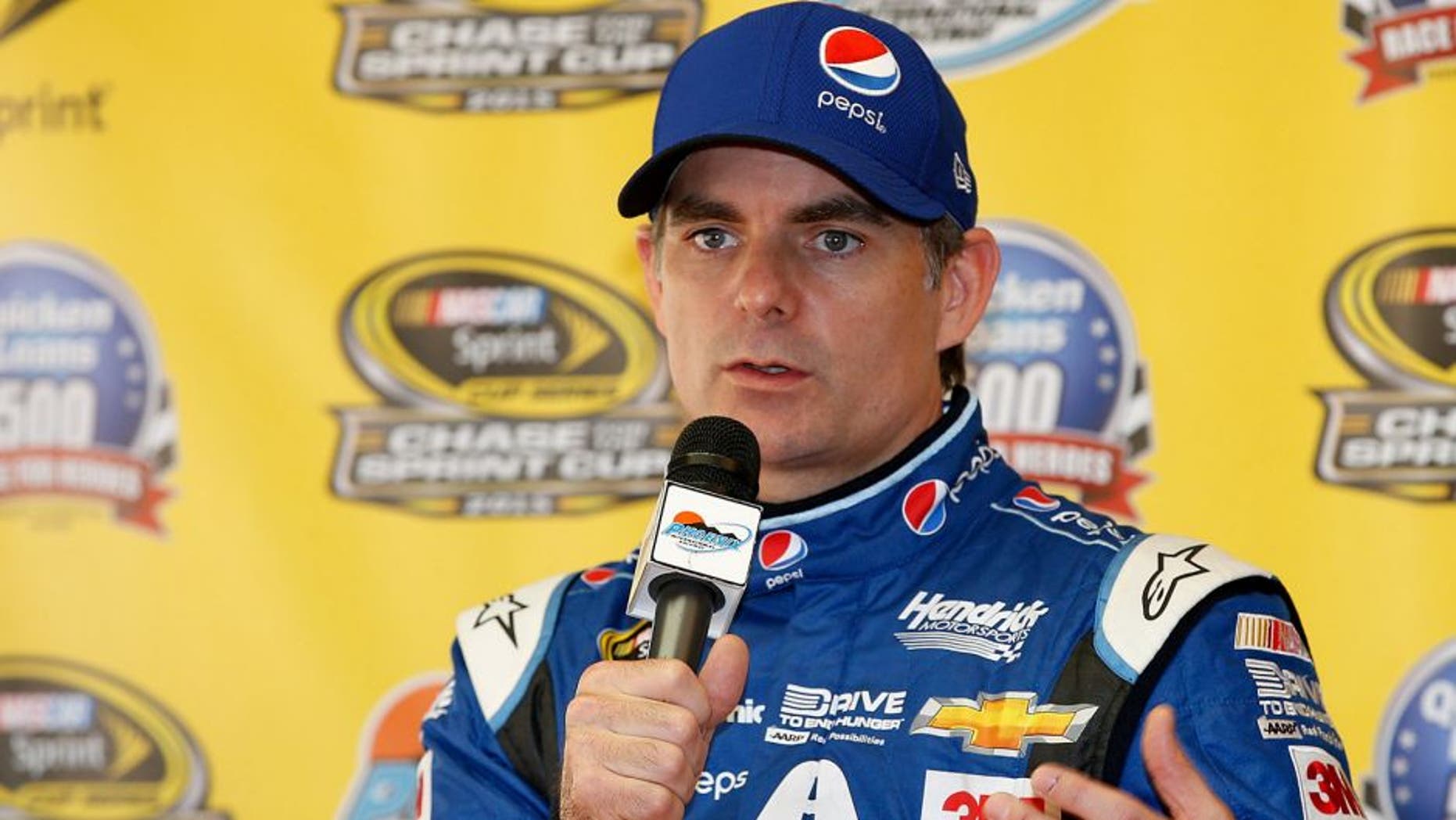AVONDALE, AZ - NOVEMBER 13: Jeff Gordon, driver of the #24 Pepsi Chevrolet, speaks at a press conference following practice for the NASCAR Sprint Cup Series Quicken Loans Race for Heroes 500 at Phoenix International Raceway on November 13, 2015 in Avondale, Arizona. (Photo by Todd Warshaw/Getty Images)