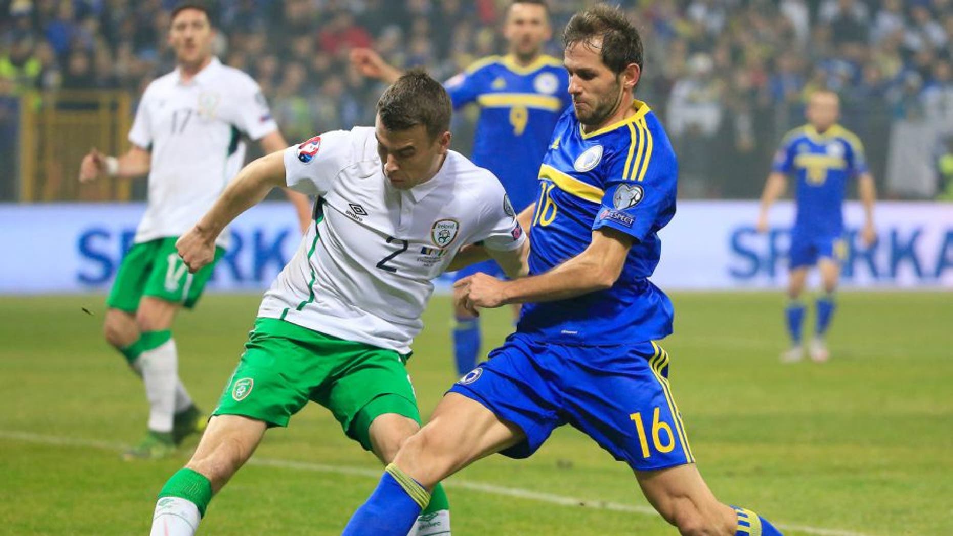 ZENICA, BOSNIA AND HERZEGOVINA - NOVEMBER 13. Seamus Coleman (L) of Ireland in action against Senad Lulic (R) of Bosnia during the EURO 2016 Qualifier Play-Off First Leg between Bosnia and Herzegovina and Republic of Ireland at Bilino Polje Stadium on November 13, 2015 in Zenica, Bosnia and Herzegovina. (Photo by Srdjan Stevanovic/Getty Images)