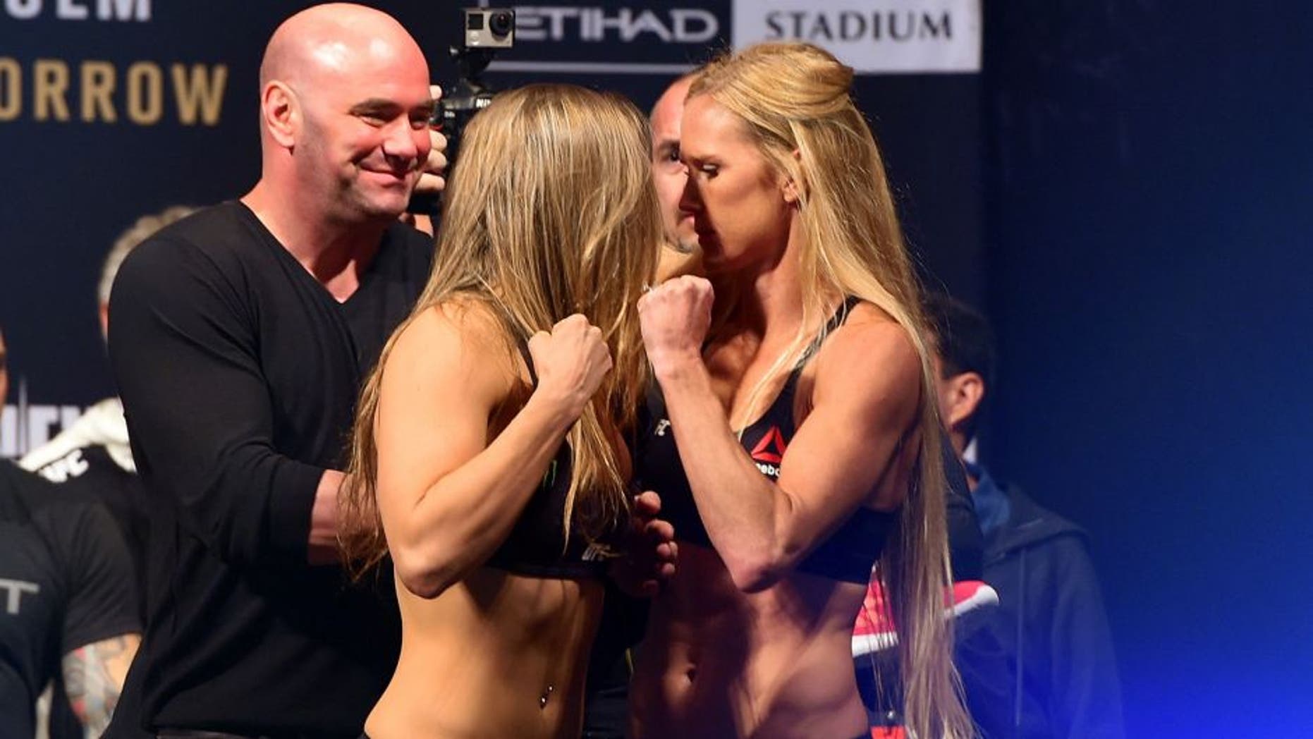 MELBOURNE, AUSTRALIA - NOVEMBER 14: (L-R) Opponents Ronda Rousey of the United States and Holly Holm of the United States face off during the UFC 193 weigh-in at Etihad Stadium on November 14, 2015 in Melbourne, Australia. (Photo by Josh Hedges/Zuffa LLC/Zuffa LLC via Getty Images)