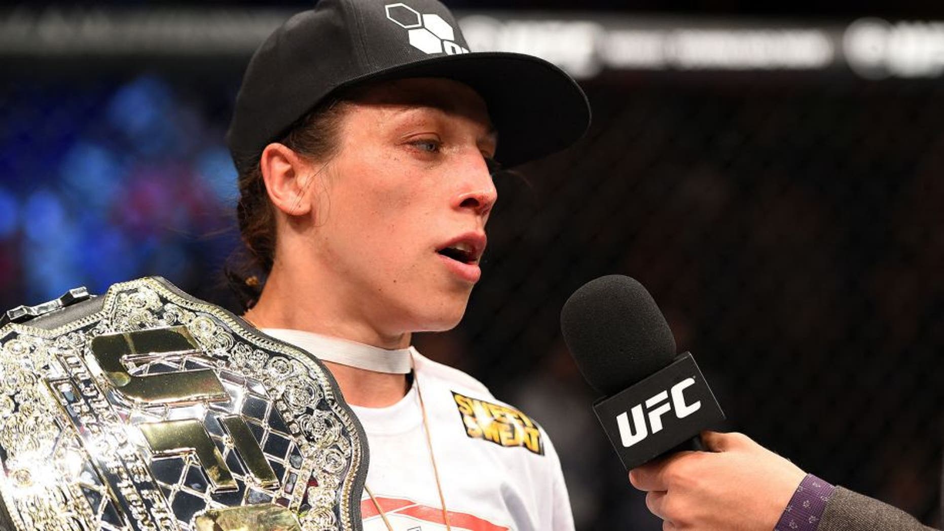 BERLIN, GERMANY - JUNE 20: UFC women's strawweight champion Joanna Jedrzejczyk of Poland celebrates after defeating Jessica Penne of the United States in their women's strawweight championship bout during the UFC Fight Night event at the O2 World on June 20, 2015 in Berlin, Germany. (Photo by Josh Hedges/Zuffa LLC/Zuffa LLC via Getty Images)