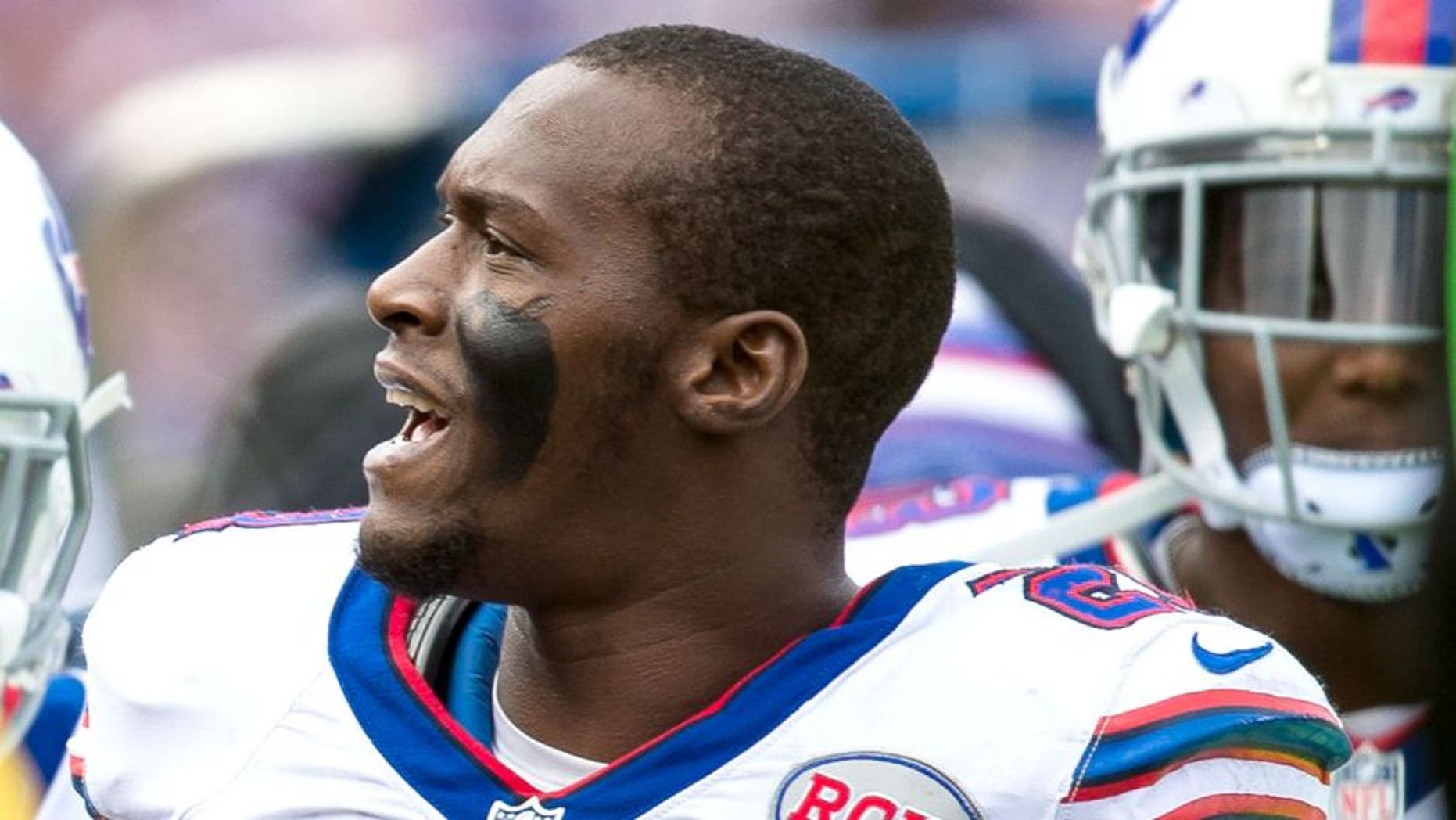 ORCHARD PARK, NY - OCTOBER 19: Leodis McKelvin #21 of the Buffalo Bills looks to the crowd to give out an interception to a lucky fan at Ralph Wilson Stadium on October 19, 2014 in Orchard Park, New York. Buffalo Bills defeat Minnesota Vikings 17-16. (Photo by Brett Carlsen/Getty Images)