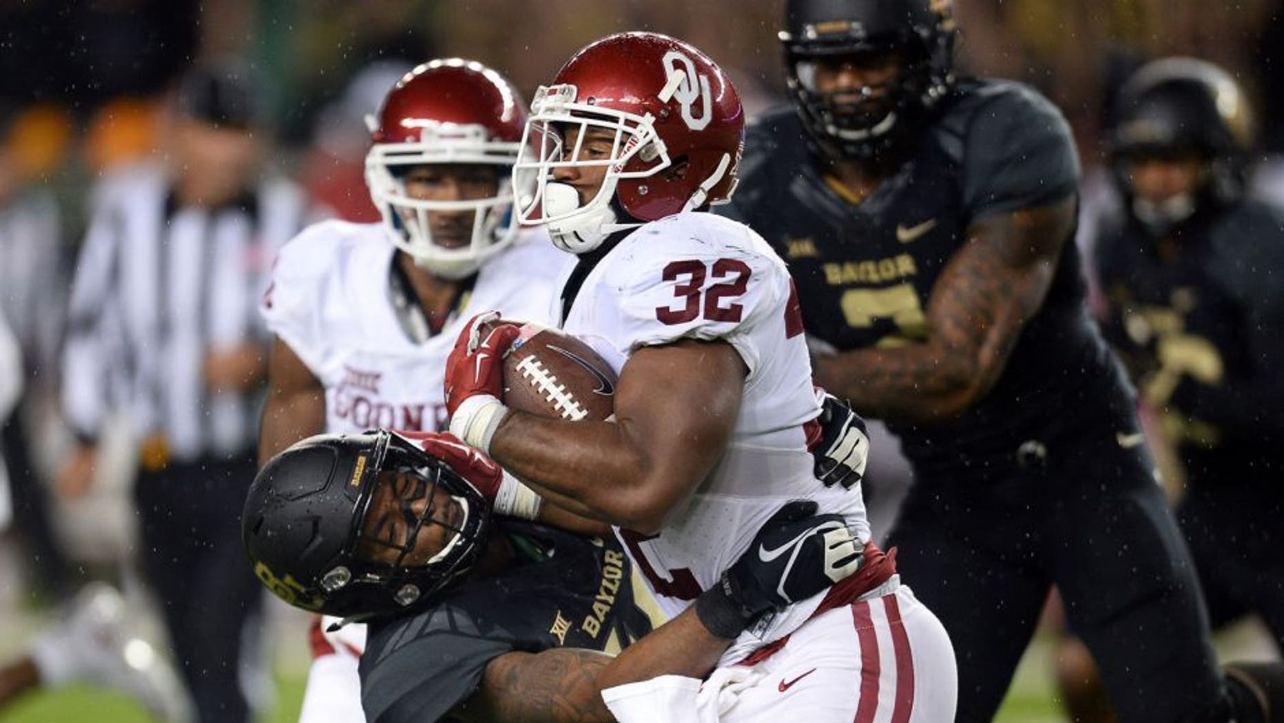 Nov 14, 2015; Waco, TX, USA; Oklahoma Sooners running back Samaje Perine (32) runs with the ball against the Baylor Bears at McLane Stadium. Oklahoma won 44-34. Mandatory Credit: Joe Camporeale-USA TODAY Sports