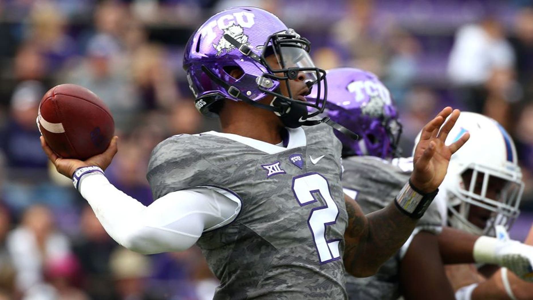 FORT WORTH, TX - NOVEMBER 14: Trevone Boykin #2 of the TCU Horned Frogs looks for an open receiver against the Kansas Jayhawks in the first quarter at Amon G. Carter Stadium on November 14, 2015 in Fort Worth, Texas. (Photo by Tom Pennington/Getty Images)