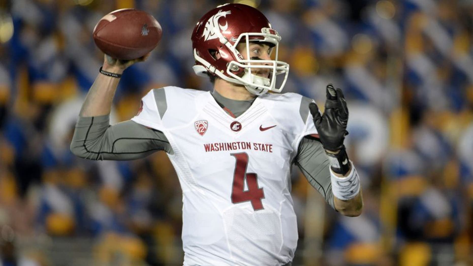 Nov 14, 2015; Pasadena, CA, USA; Washington State Cougars quarterback Luke Falk (4) throws a pass against the UCLA Bruins in a NCAA football game at Rose Bowl. Mandatory Credit: Kirby Lee-USA TODAY Sports