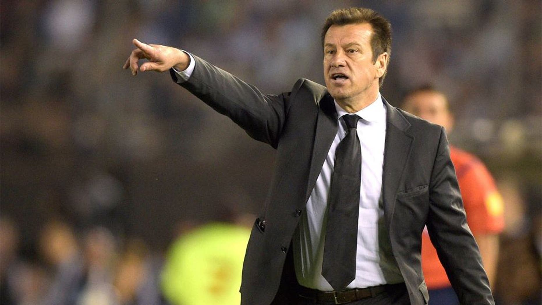 Brazil's coach Dunga gestures during the Russia 2018 FIFA World Cup South American Qualifiers football match against Argentina , in Buenos Aires, on November 13, 2015. AFP PHOTO / JUAN MABROMATA (Photo credit should read JUAN MABROMATA/AFP/Getty Images)