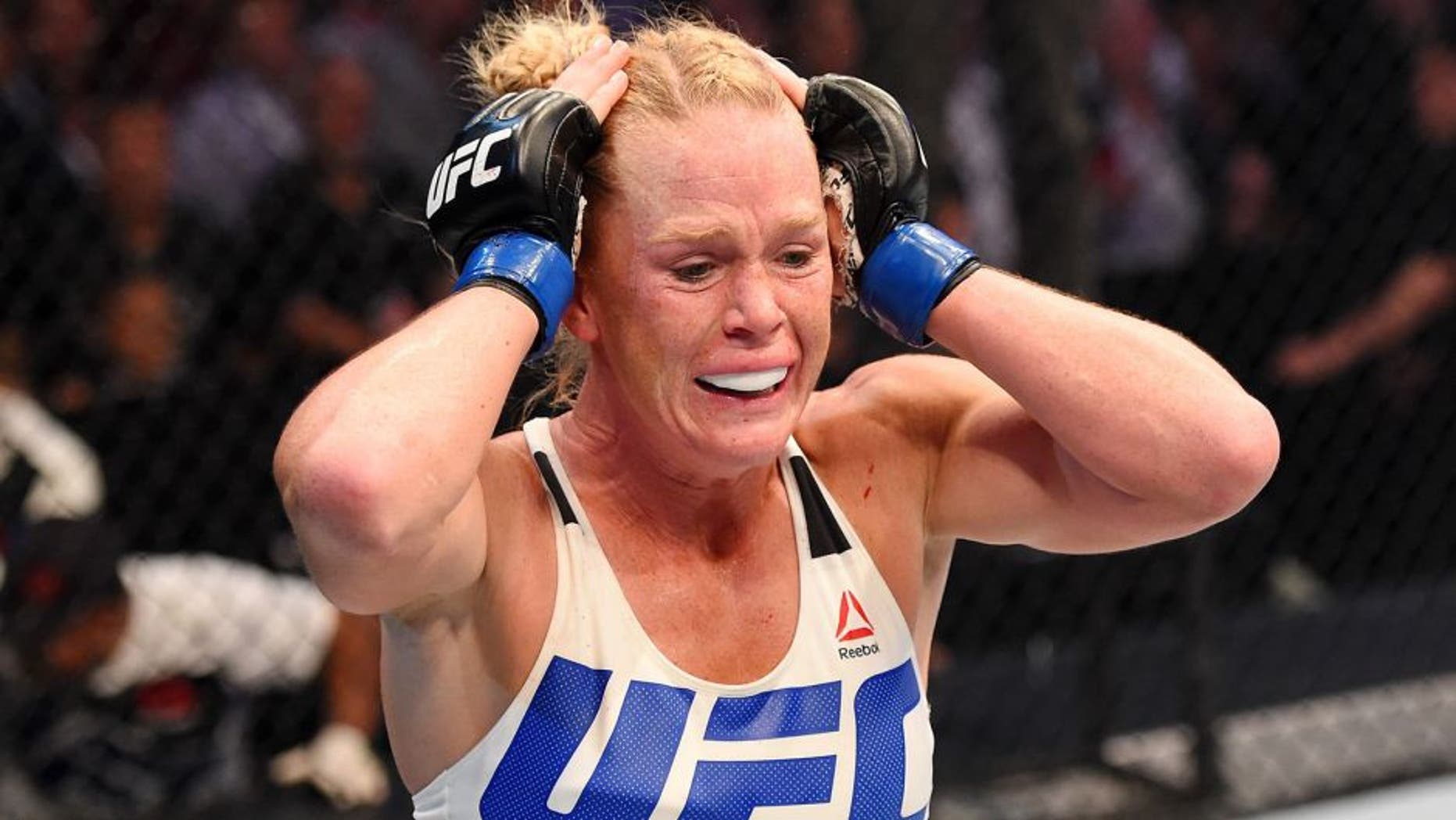 MELBOURNE, AUSTRALIA - NOVEMBER 15: Holly Holm celebrates her second round KO (headkick and punches) over Ronda Rousey (not pictured) in their UFC women's bantamweight championship bout during the UFC 193 event at Etihad Stadium on November 15, 2015 in Melbourne, Australia. (Photo by Josh Hedges/Zuffa LLC/Zuffa LLC via Getty Images)