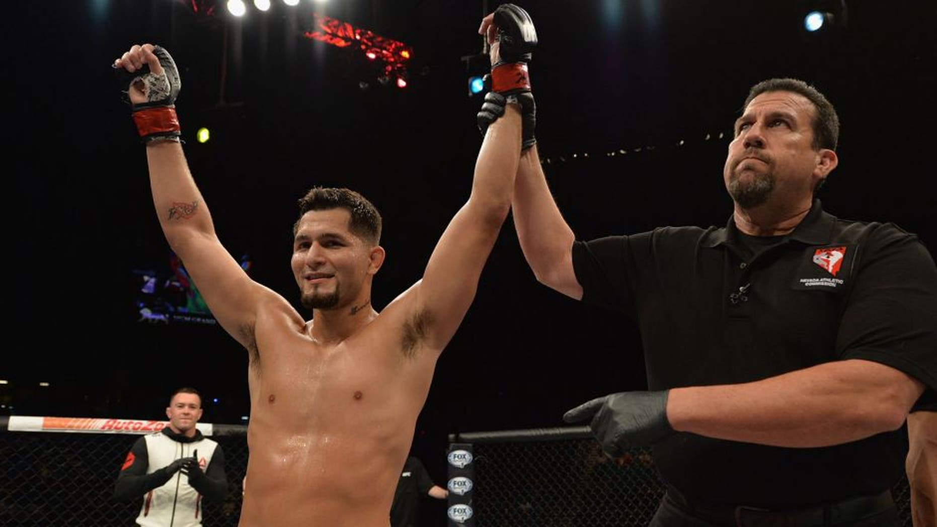 LAS VEGAS, NV - JULY 12: Jorge Masvidal reacts to his victory over Cezar Ferreira in their welterweight bout during the Ultimate Fighter Finale inside MGM Grand Garden Arena on July 12, 2015 in Las Vegas, Nevada. (Photo by Brandon Magnus/Zuffa LLC/Zuffa LLC via Getty Images)