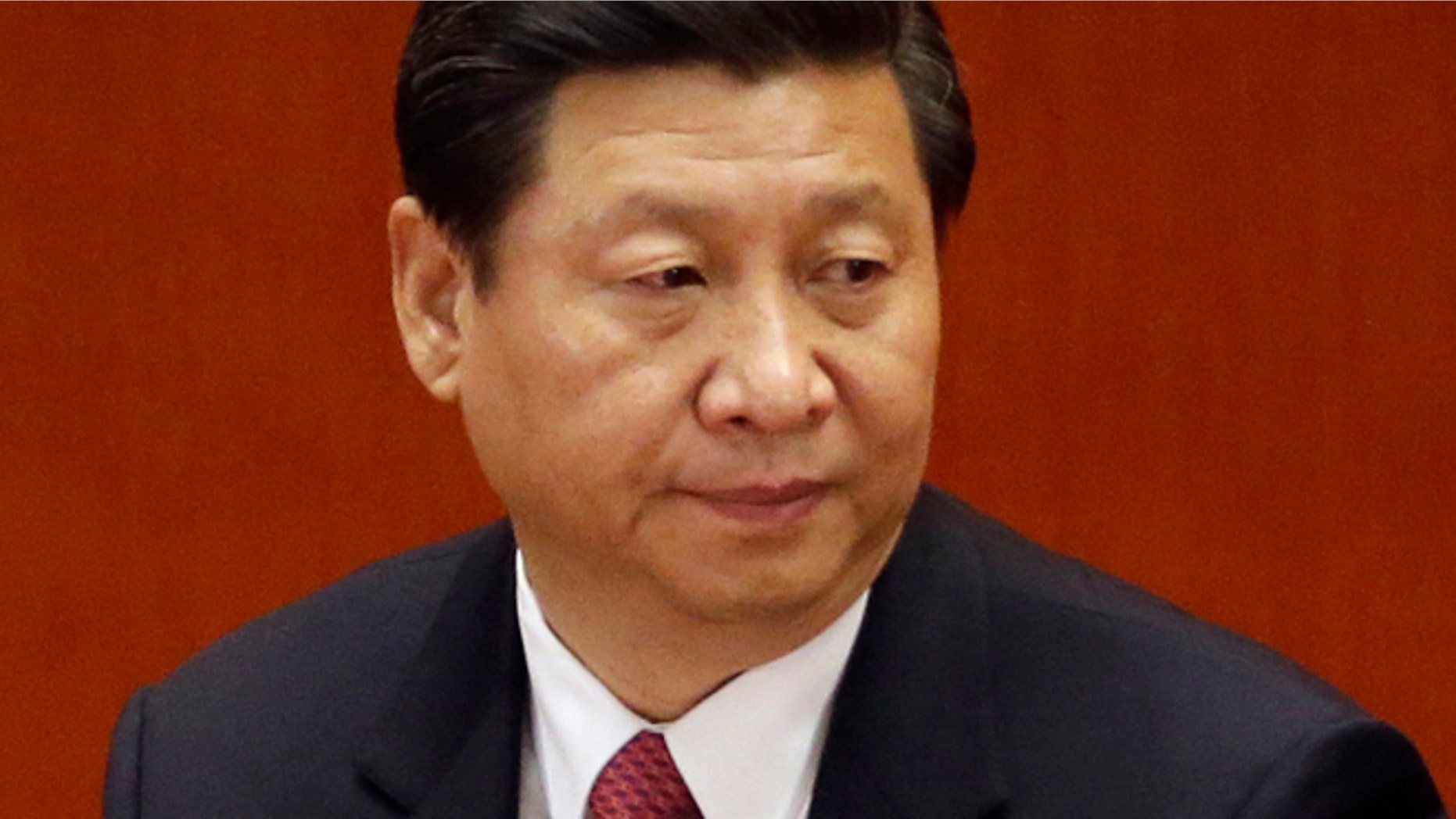 Chinese Vice President Xi Jinping attends during the closing ceremony for the 18th Communist Party Congress at the Great Hall of the People in Beijing, China, Wednesday, Nov. 14, 2012. Designated as successor five years ago, Xi will take over as party general secretary from Hu Jintao on Thursday, Nov. 15 and as president next spring, in only Chinas second orderly transfer of power. (AP Photo/Lee Jin-man)