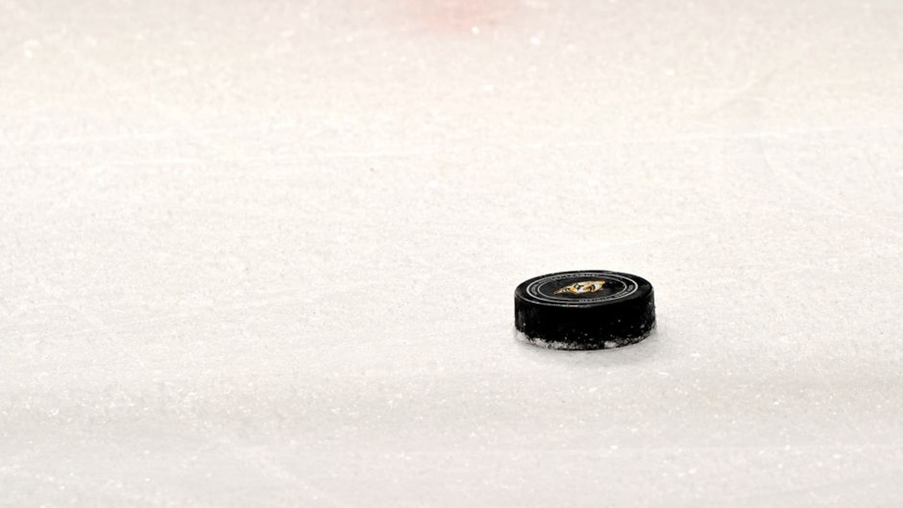 NASHVILLE, TN - MARCH 01: A Nashville Predators game puck rests on the ice during a game against the Winnipeg Jets at Bridgestone Arena on March 1, 2014 in Nashville, Tennessee. (Photo by Frederick Breedon/Getty Images)