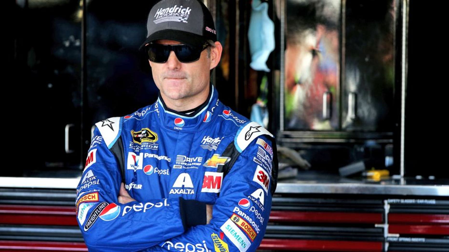 AVONDALE, AZ - NOVEMBER 14: Jeff Gordon, driver of the #24 Pepsi Chevrolet, stands in the garage area during practice for the NASCAR Sprint Cup Series Quicken Loans Race for Heroes 500 at Phoenix International Raceway on November 14, 2015 in Avondale, Arizona. (Photo by Sean Gardner/Getty Images)