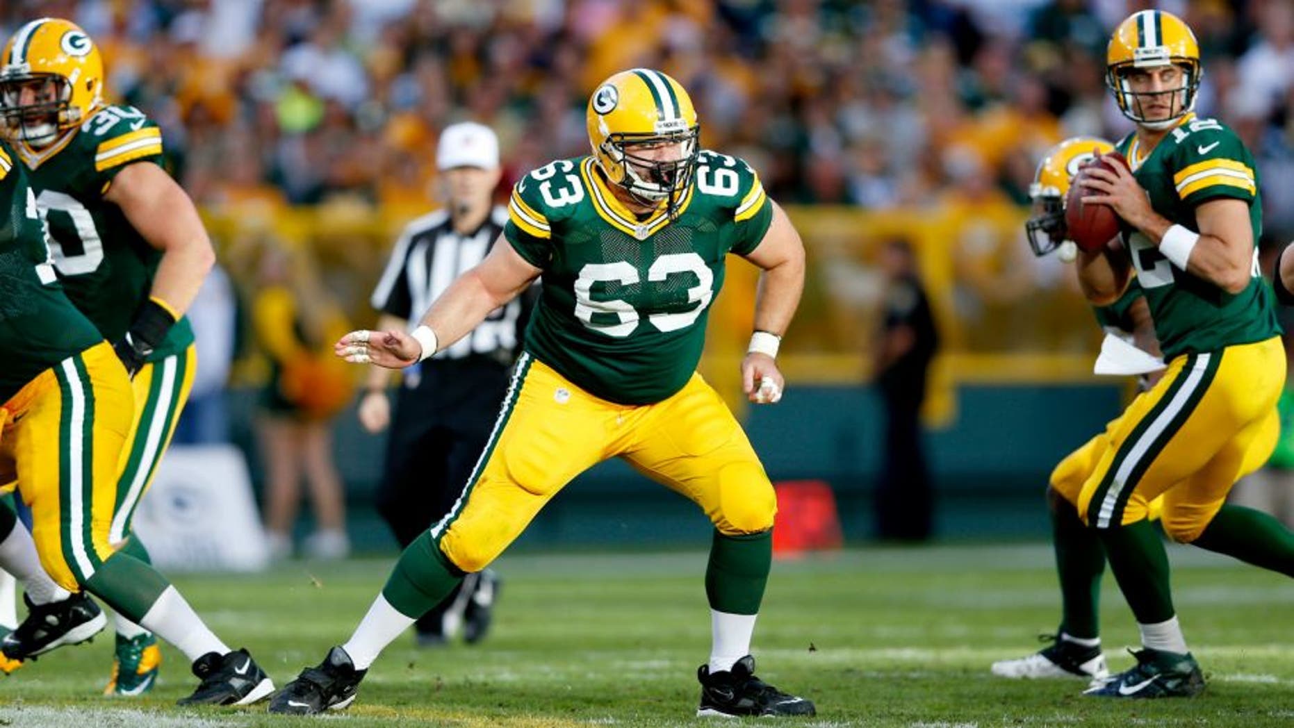 GREEN BAY, WI - SEPTEMBER 09: Jeff Saturday #63 of the Green Bay Packers blocks against the San Francisco 49ers during the game at Lambeau Field on September 9, 2012 in Green Bay, Wisconsin. The 49ers won 30-22. (Photo by Joe Robbins/Getty Images)