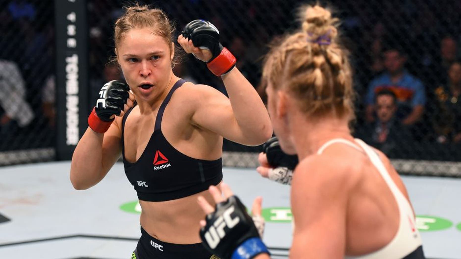 MELBOURNE, AUSTRALIA - NOVEMBER 15: (L-R) Ronda Rousey and Holly Holm size each other up in the first round in their UFC women's bantamweight championship bout during the UFC 193 event at Etihad Stadium on November 15, 2015 in Melbourne, Australia. (Photo by Josh Hedges/Zuffa LLC/Zuffa LLC via Getty Images)