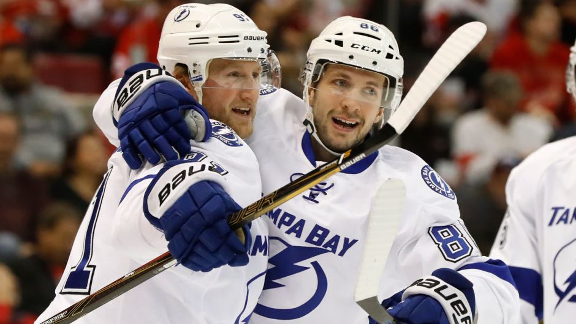 Tampa Bay Lightning center Steven Stamkos, left, celebrates his goal against the Detroit Red Wings with Nikita Kucherov in the first period of an NHL hockey game Tuesday, Nov. 15, 2016 in Detroit. (AP Photo/Paul Sancya)