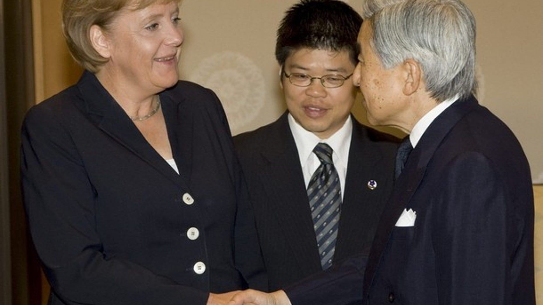 Aug. 29, 2007: Japan's Emperor Akihito greets German Chancellor Angela Merkel during their meeting in Tokyo (Reuters).