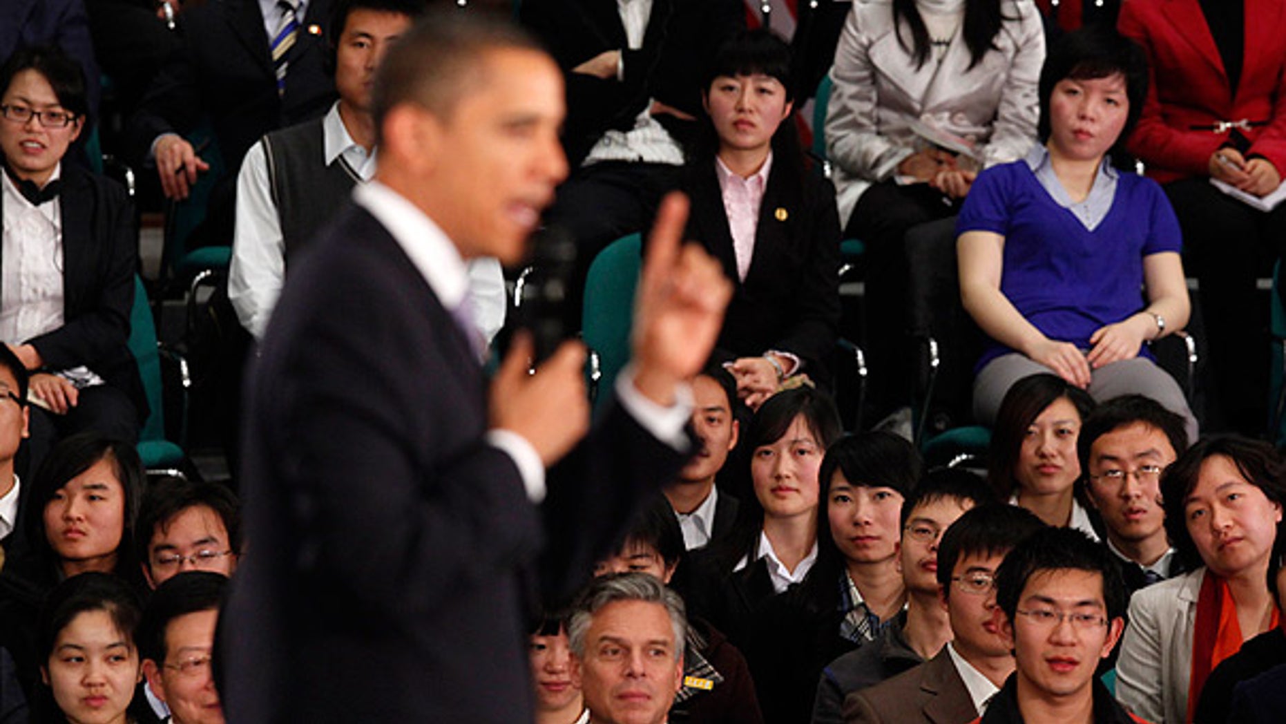 Nov. 16: Audience members listen as President Obama speaks at a town hall style event with Chinese youth at the Museum of Science and Technology in Shanghai. (AP)
