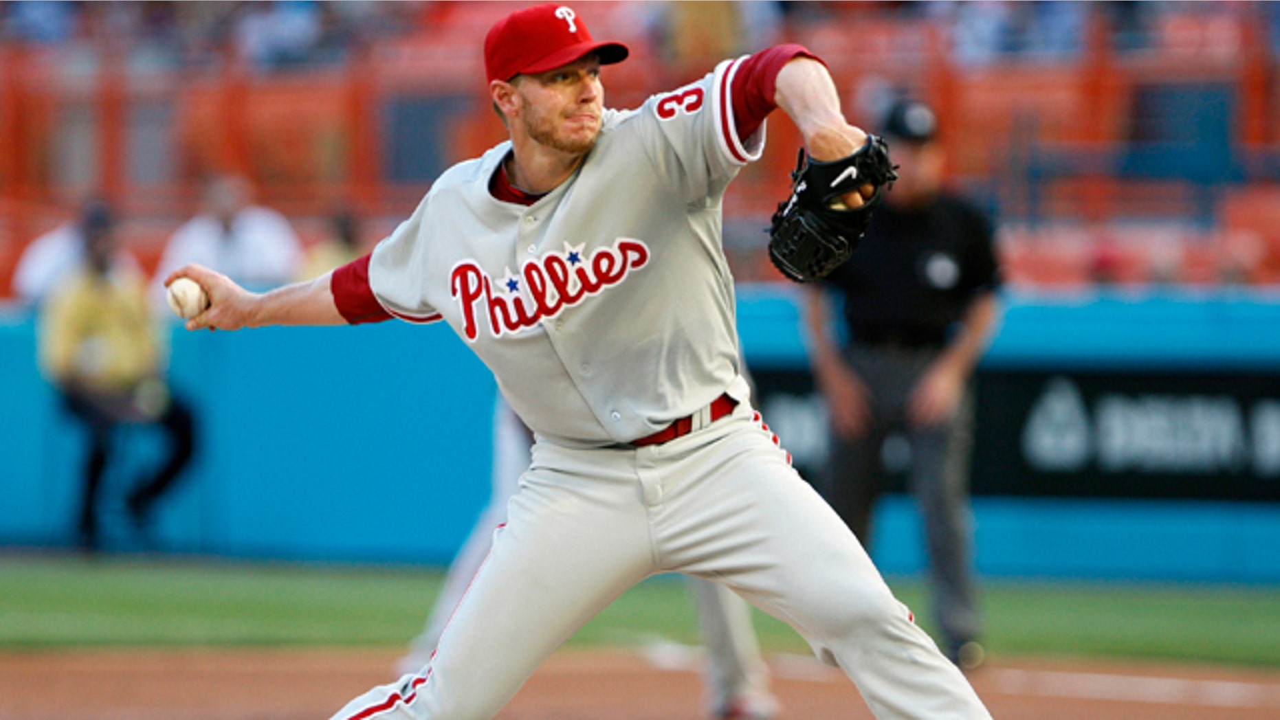 This May 29, 2010, file photo shows Philadelphia Phillies' Roy Halladay throwing a pitch during the first inning, enroute to a perfect game, against the Florida Marlins, in Miami.