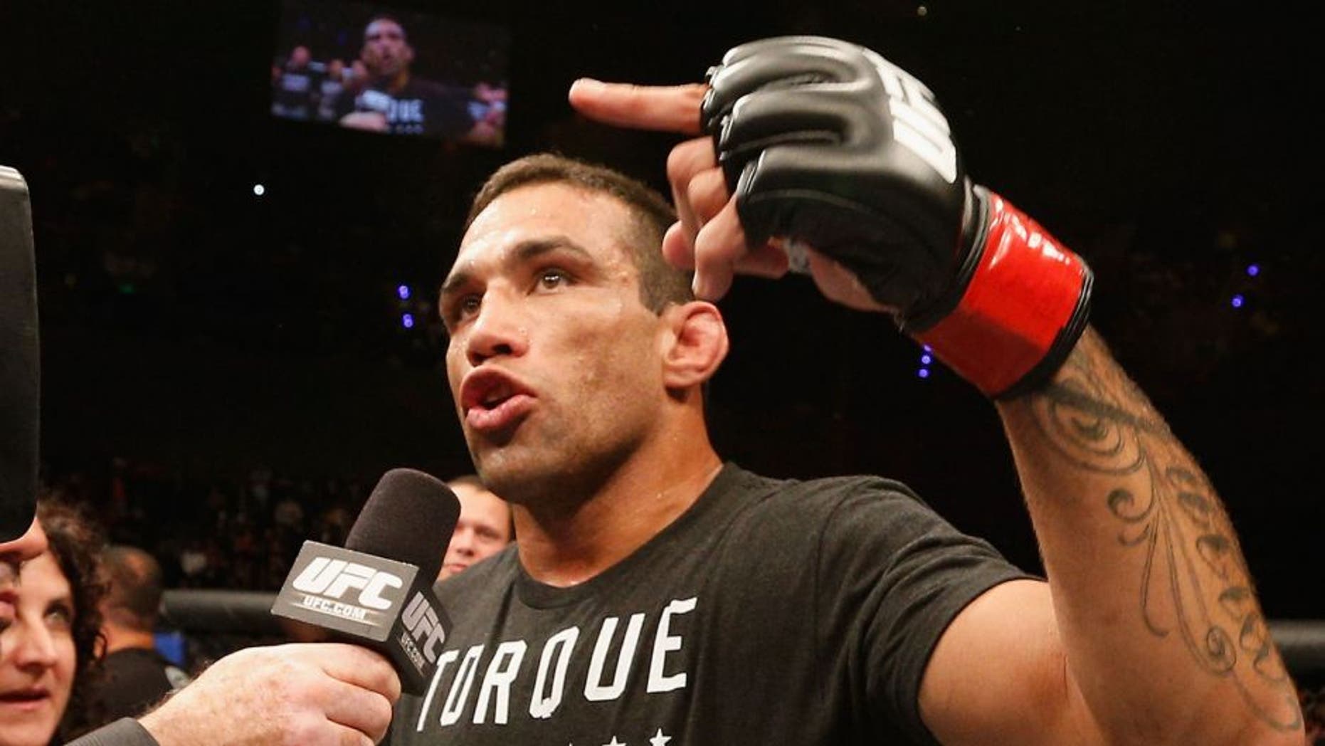 MEXICO CITY, MEXICO - NOVEMBER 15: Fabricio Werdum of Brazil celebrates after knocking out Mark Hunt in their interim UFC heavyweight championship bout during the UFC 180 event at Arena Ciudad de Mexico on November 15, 2014 in Mexico City, Mexico. (Photo by Josh Hedges/Zuffa LLC/Zuffa LLC via Getty Images)