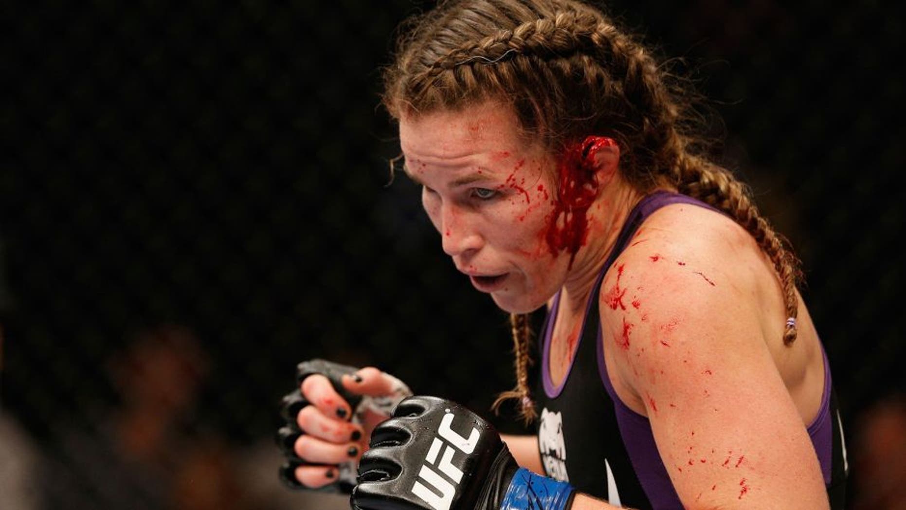 MEXICO CITY, MEXICO - NOVEMBER 15: Leslie Smith prepares to go another round against Jessica Eye in their women's bantamweight bout during the UFC 180 event at Arena Ciudad de Mexico on November 15, 2014 in Mexico City, Mexico. (Photo by Josh Hedges/Zuffa LLC/Zuffa LLC via Getty Images)