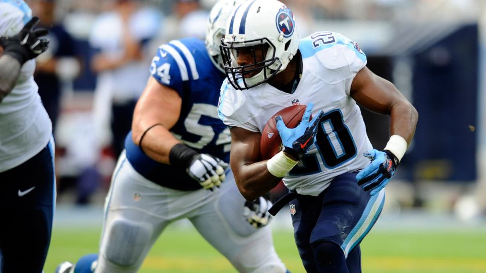 Sep 27, 2015; Nashville, TN, USA; Tennessee Titans running back Bishop Sankey (20) runs for a short gain during the second half against the Indianapolis Colts at Nissan Stadium. The Colts won 35-33. Mandatory Credit: Christopher Hanewinckel-USA TODAY Sports