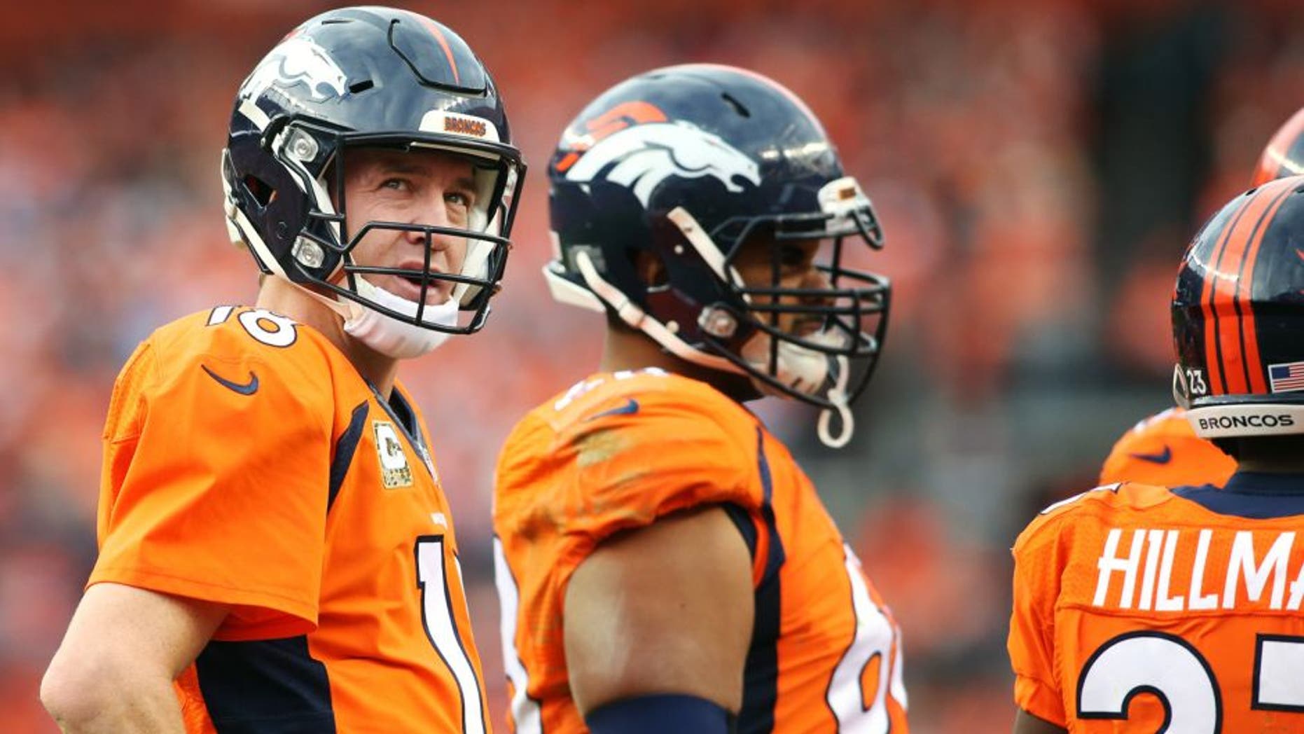 Nov 15, 2015; Denver, CO, USA; Denver Broncos quarterback Peyton Manning (18) looks on during the first half against the Kansas City Chiefs at Sports Authority Field at Mile High. Mandatory Credit: Chris Humphreys-USA TODAY Sports