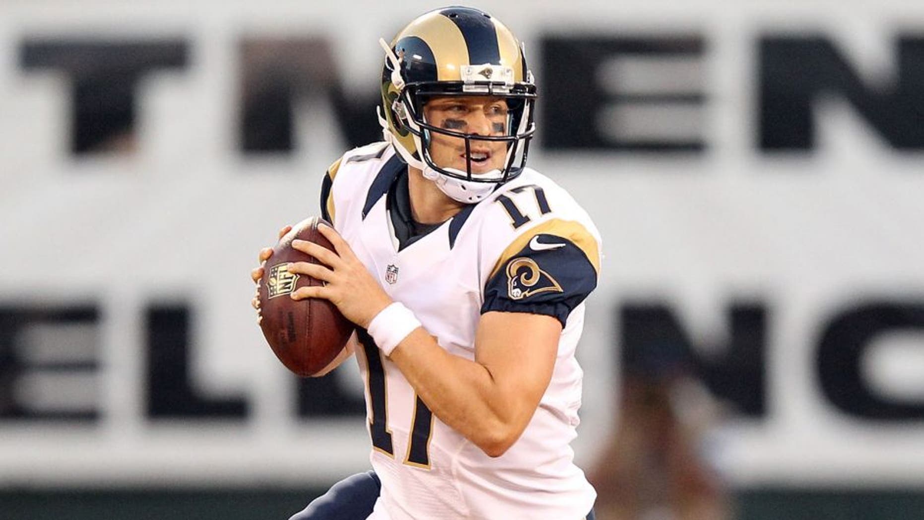 OAKLAND, CA - AUGUST 14: Case Keenum #17 of the St. Louis Rams looks to pass the ball against the Oakland Raiders at O.co Coliseum on August 14, 2015 in Oakland, California. (Photo by Ezra Shaw/Getty Images)