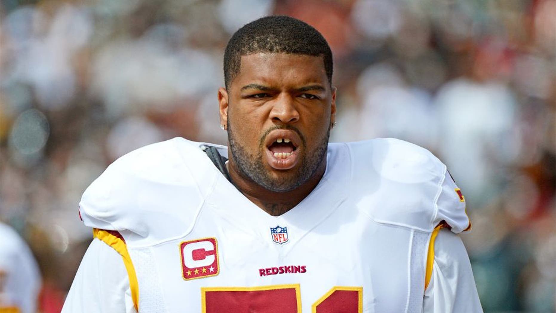 September 29, 2013; Oakland, CA, USA; Washington Redskins tackle Trent Williams (71) walks the sideline before the game against the Oakland Raiders at O.co Coliseum. The Redskins defeated the Raiders 24-14. Mandatory Credit: Kyle Terada-USA TODAY Sports