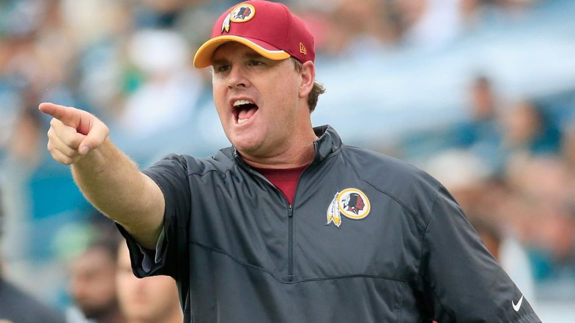 PHILADELPHIA, PA - SEPTEMBER 21: Head coach Jay Gruden of the Washington Redskins points to an officail during the second half against the Philadelphia Eagles at Lincoln Financial Field on September 21, 2014 in Philadelphia, Pennsylvania. The Eagles won 37-34. (Photo by Rob Carr/Getty Images)