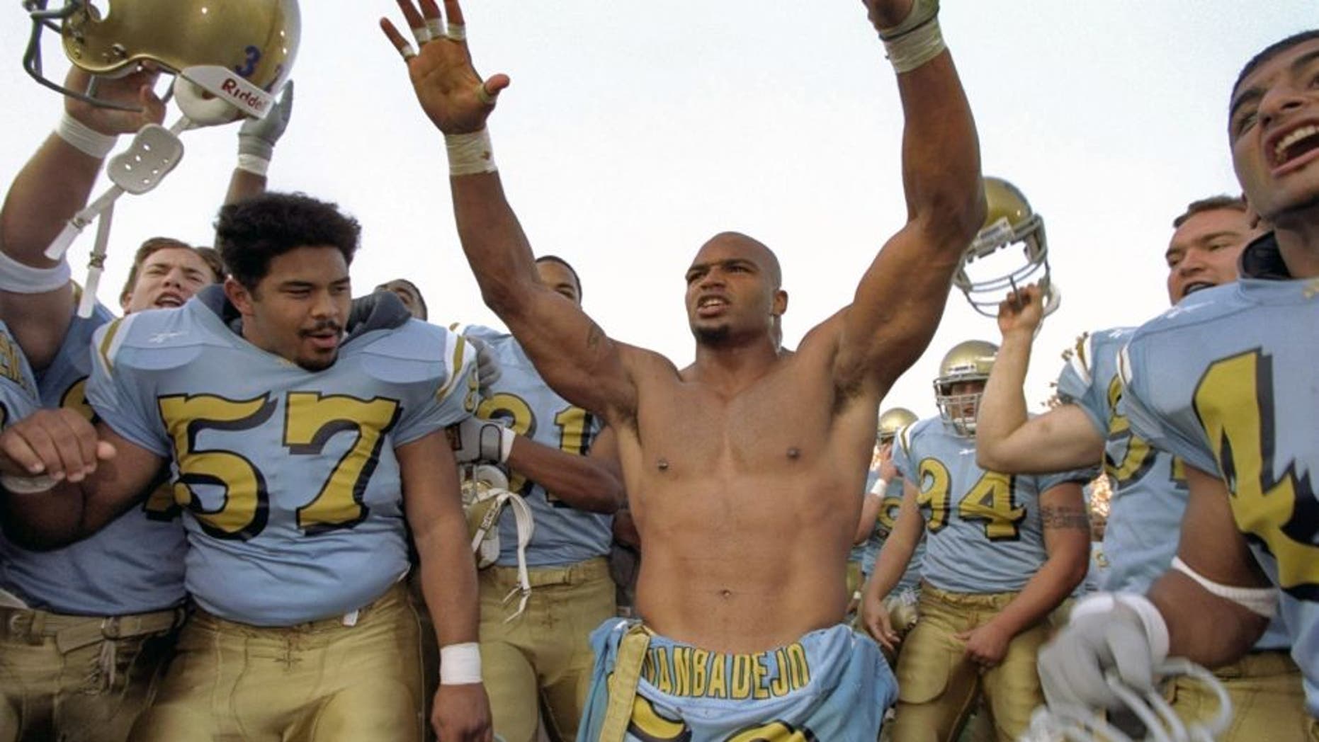 21 Nov 1998: Linebacker Brendon Ayanbadejo #50 of the UCLA Bruins celebrates during the game against the USC Trojans at the Rose Bowl in Pasadena, California. The Bruins defeated the Trojans 34-17. Mandatory Credit: Tom Hauck /Allsport
