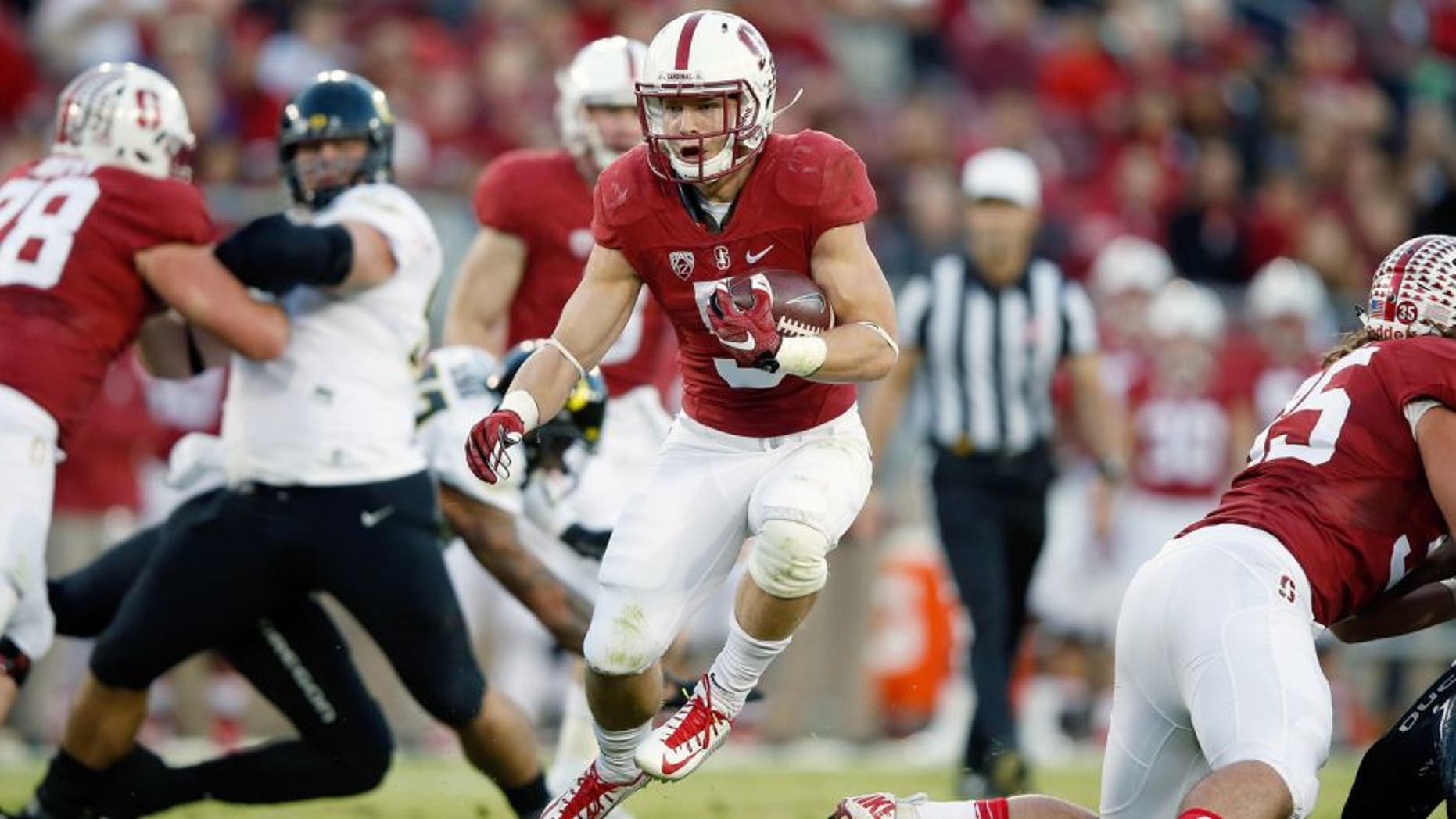 PALO ALTO, CA - NOVEMBER 14: Christian McCaffrey #5 of the Stanford Cardinal runs with the ball against the Oregon Ducks at Stanford Stadium on November 14, 2015 in Palo Alto, California. (Photo by Ezra Shaw/Getty Images)
