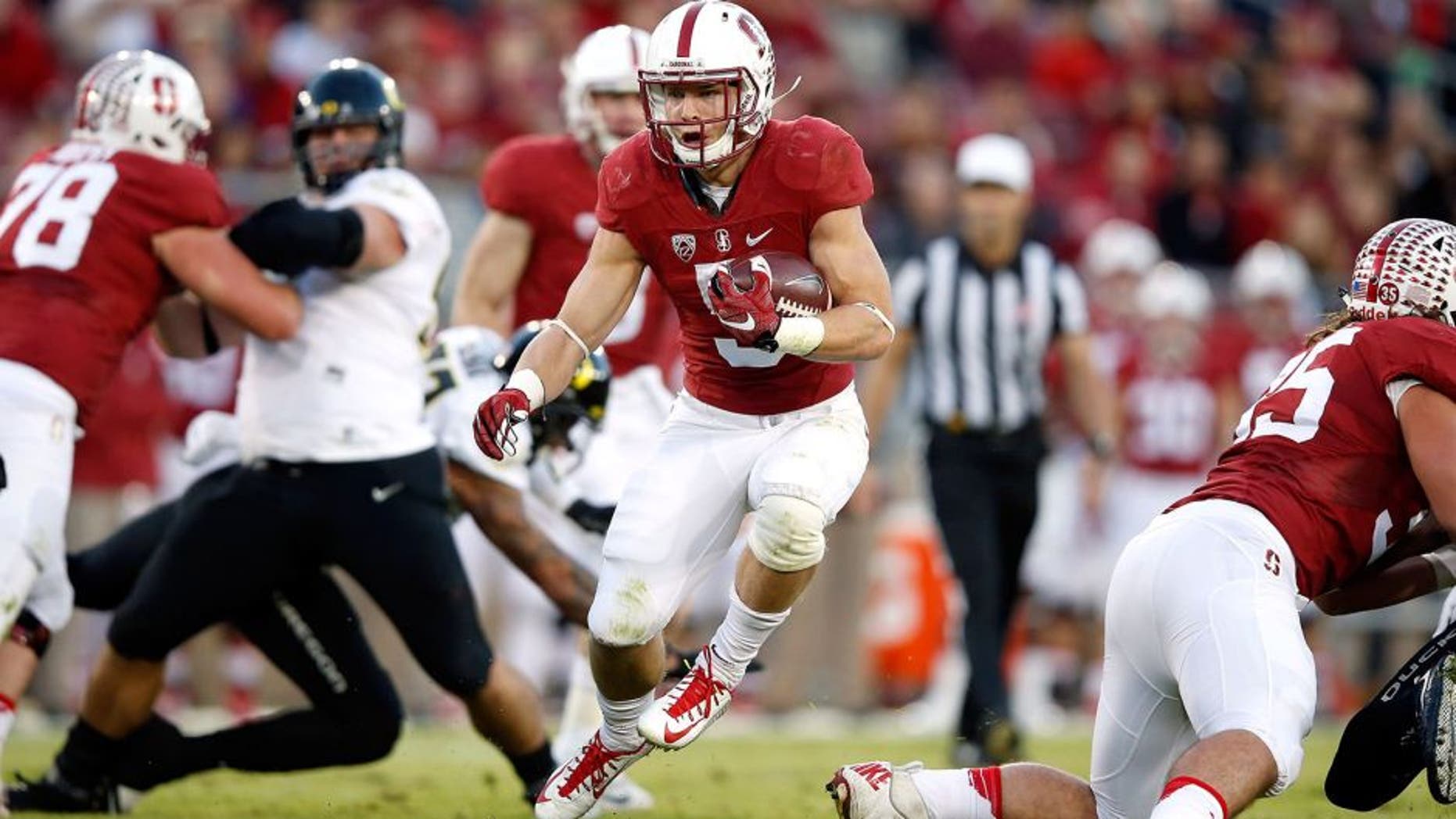 PALO ALTO, CA - NOVEMBER 14: Christian McCaffrey #5 of the Stanford Cardinal runs with the ball against the Oregon Ducks at Stanford Stadium on November 14, 2015 in Palo Alto, California. (Photo by Ezra Shaw/Getty Images)