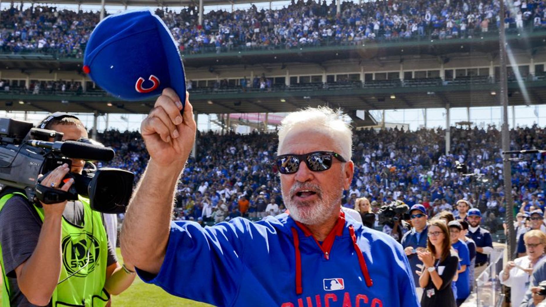 Sep 26, 2015; Chicago, IL, USA; Chicago Cubs manager Joe Maddon (70) acknowledges the crowd before the game against the Pittsburgh Pirates at Wrigley Field. Mandatory Credit: Matt Marton-USA TODAY Sports