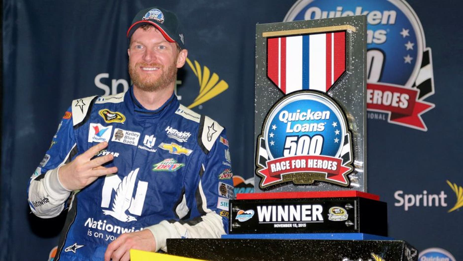 AVONDALE, AZ - NOVEMBER 15: Dale Earnhardt Jr., driver of the #88 Nationwide Chevrolet, celebrates in victory lane after winning the rain-shortened NASCAR Sprint Cup Series Quicken Loans Race for Heroes 500 at Phoenix International Raceway on November 15, 2015 in Avondale, Arizona. (Photo by Matt Sullivan/NASCAR via Getty Images)