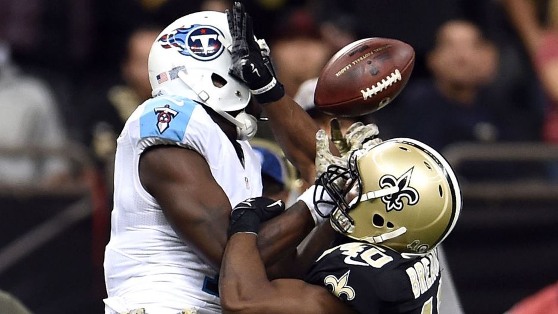 NEW ORLEANS, LA - NOVEMBER 08: Delvin Breaux #40 of the New Orleans Saints defends a pass intended for Dorial Green-Beckham #17 of the Tennessee Titans during a game at the Mercedes-Benz Superdome on November 8, 2015 in New Orleans, Louisiana. The Titans won the game in overtime 34-28. (Photo by Stacy Revere/Getty Images)