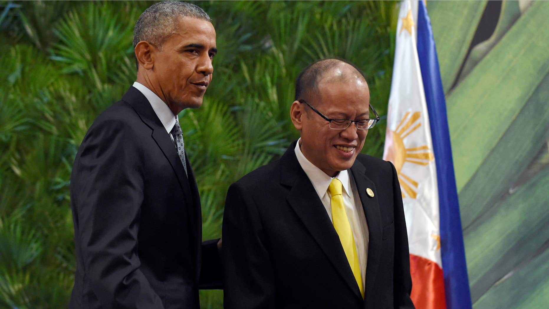 Nov. 18, 2015: President Barack Obama, left, and Philippines' President Benigno Aquino III, right, walk off of the stage after participating in a news conference in Manila, Philippines ahead of the start of the Asia-Pacific Economic Cooperation summit.