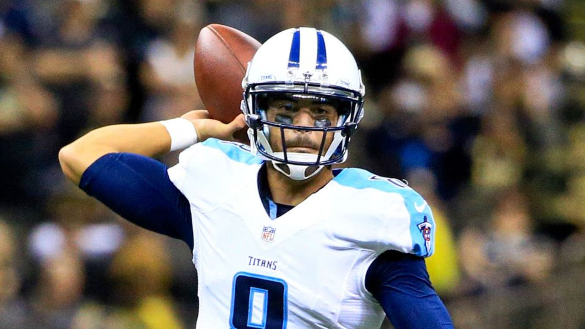 Nov 8, 2015; New Orleans, LA, USA; Tennessee Titans quarterback Marcus Mariota (8) against the New Orleans Saints during the second half of a game at the Mercedes-Benz Superdome. The Titans defeated the Saints 34-28 in overtime. Mandatory Credit: Derick E. Hingle-USA TODAY Sports