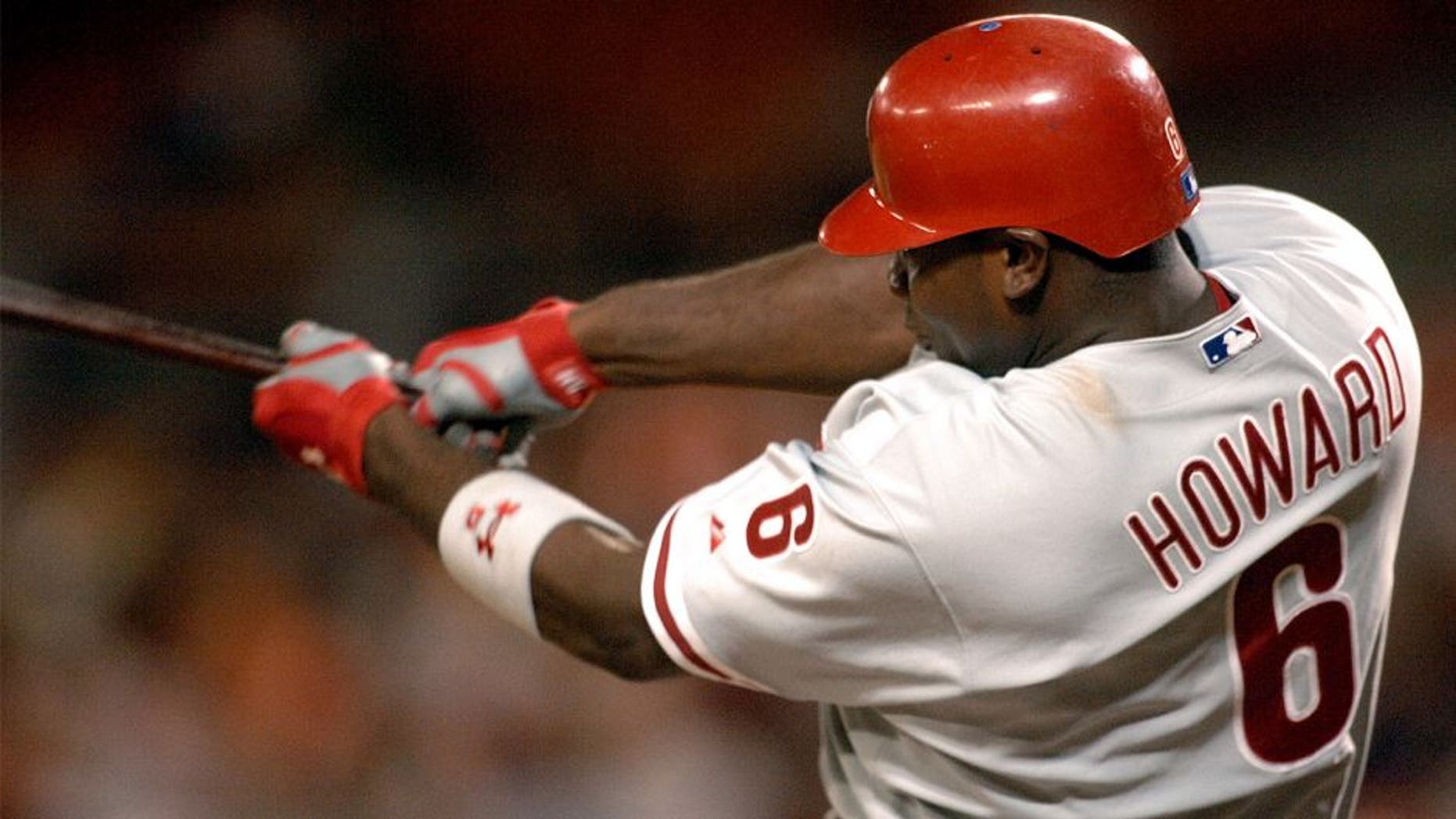 WASHINGTON - AUGUST 31: Ryan Howard #6 of the Philadelphia Phillies hits his 49th home run of the season giving him the Phillies single season record, previously held by Hall of Famer Mike Schmidt (1980), in the baseball game against the Washington Nationals on August 31, 2006 at RFK Stadium in Washington D.C. The Nationals won in 10 innings 6-5. (Photo by Mitchell Layton/Getty Images) *** Local Caption *** Ryan Howard