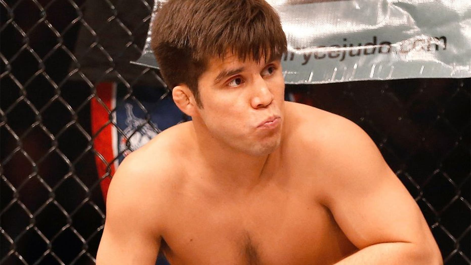 PHOENIX, AZ - DECEMBER 13: Henry Cejudo is introduced during the UFC Fight Night event against Dustin Kimura (not pictured) at the at U.S. Airways Center on December 13, 2014 in Phoenix, Arizona. (Photo by Christian Petersen/Getty Images)