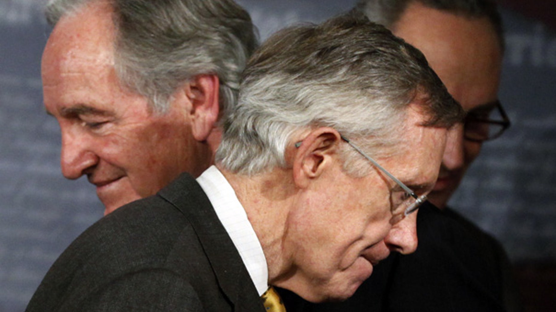 Nov. 18: Senate Majority Leader Sen. Harry Reid, D-Nev., with Sens. Tom Harkin, D-Iowa, left, and Charles Schumer, D-N.Y. at a news conference on Capitol Hill. (AP)