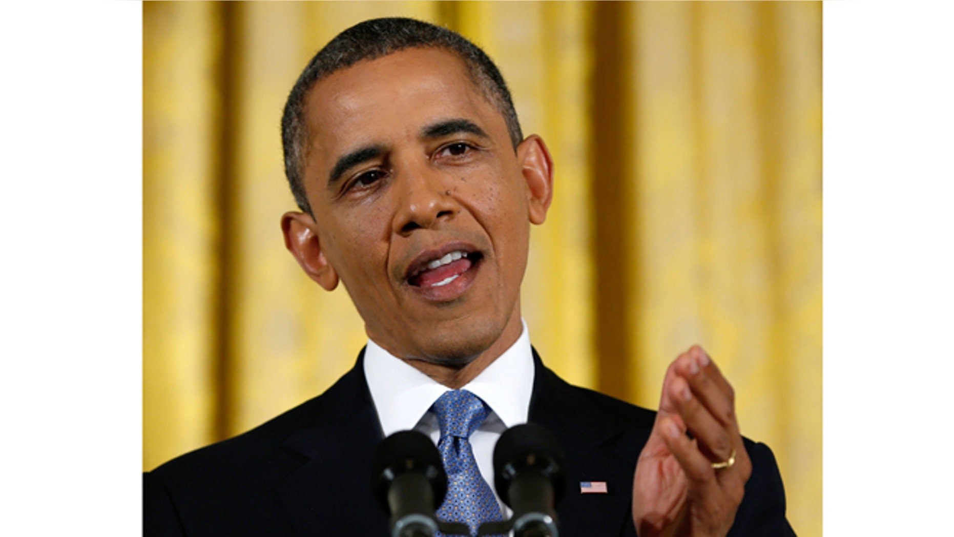 FILE: Nov. 14, 2012: President Obama gesturing while answering a question during a news conference in the East Room of the White House.