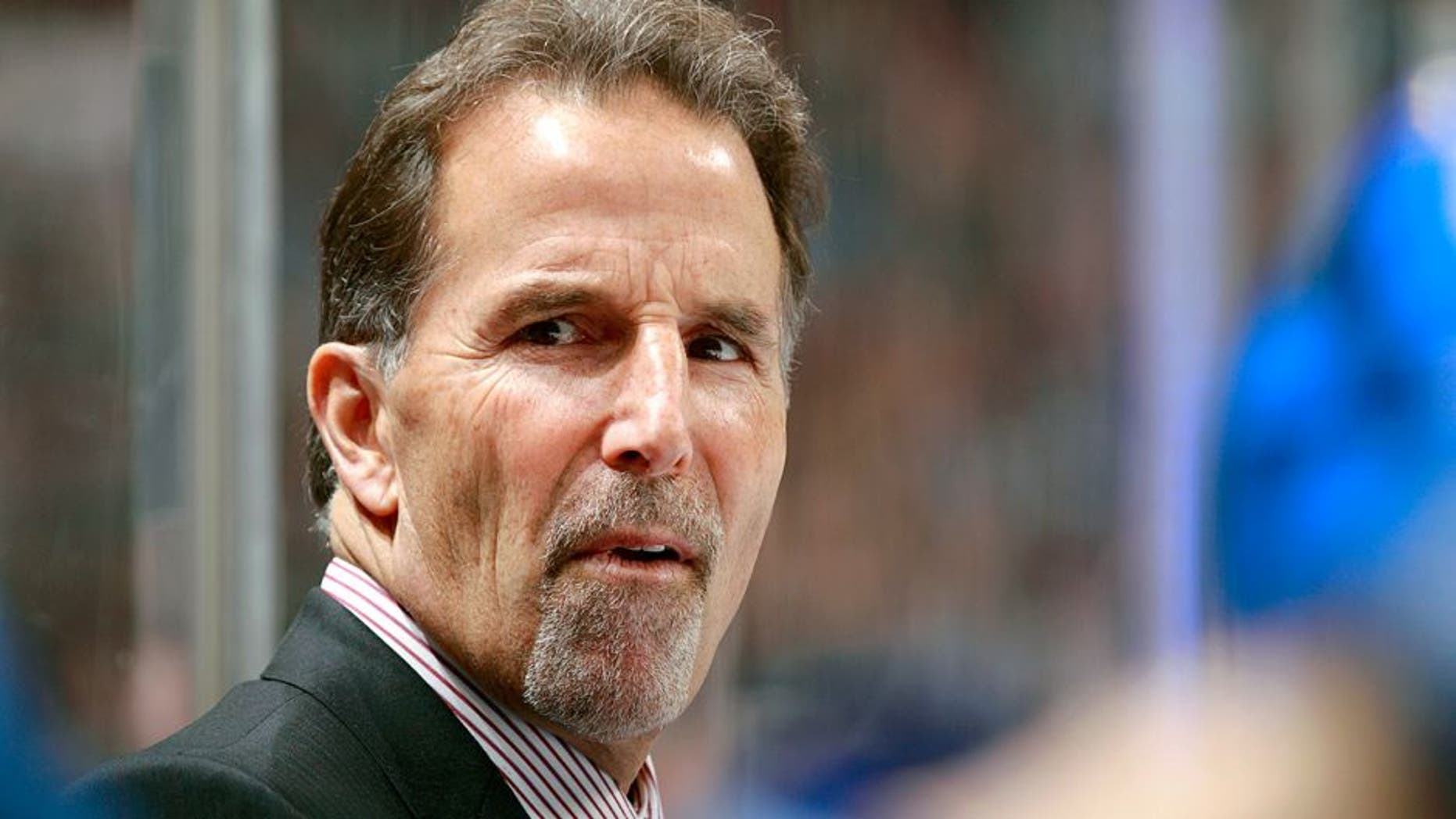 VANCOUVER, BC - NOVEMBER 22: Head coach John Tortorella of the Vancouver Canucks looks on from the bench during their NHL game against the Columbus Blue Jackets at Rogers Arena on November 22, 2013 in Vancouver, British Columbia, Canada. Vancouver won 6-2. (Photo by Jeff Vinnick/NHLI via Getty Images)