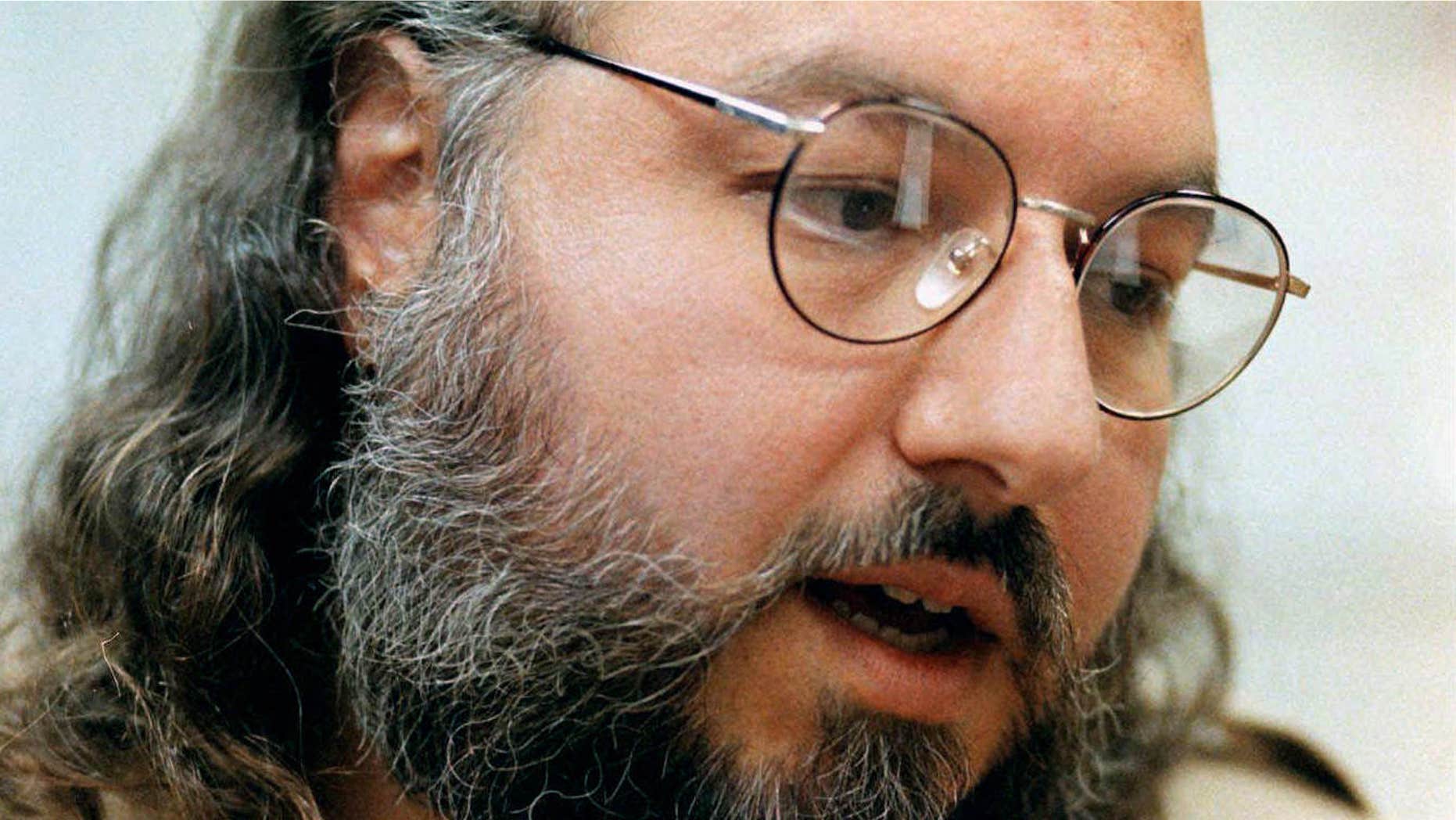 FILE - In this May 15, 1998 file photo, Jonathan Pollard speaks during an interview in a conference room at the Federal Correction Institution in Butner, N.C.