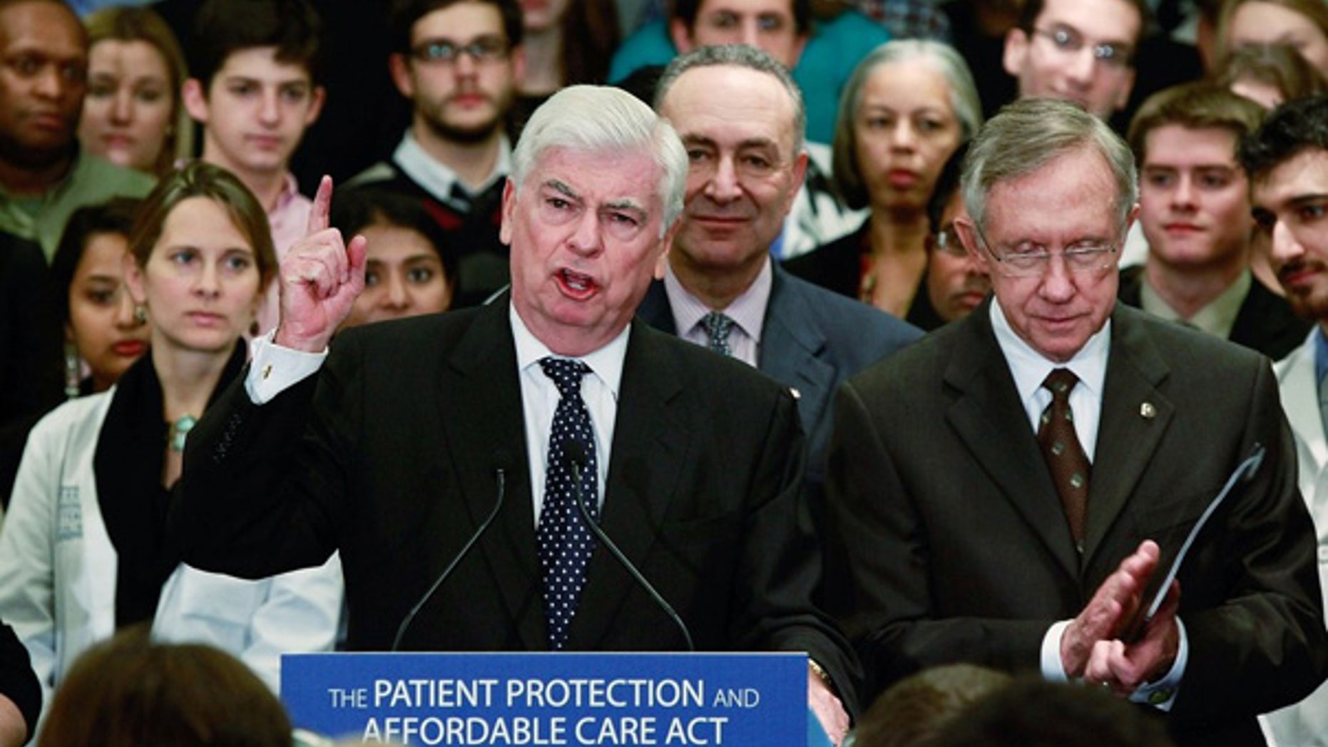 Nov. 19: From left, Democratic Sens. Chris Dodd, Charles Schumer, and Senate Majority Leader Harry Reid at a health care news conference on Capitol Hill. (AFP)