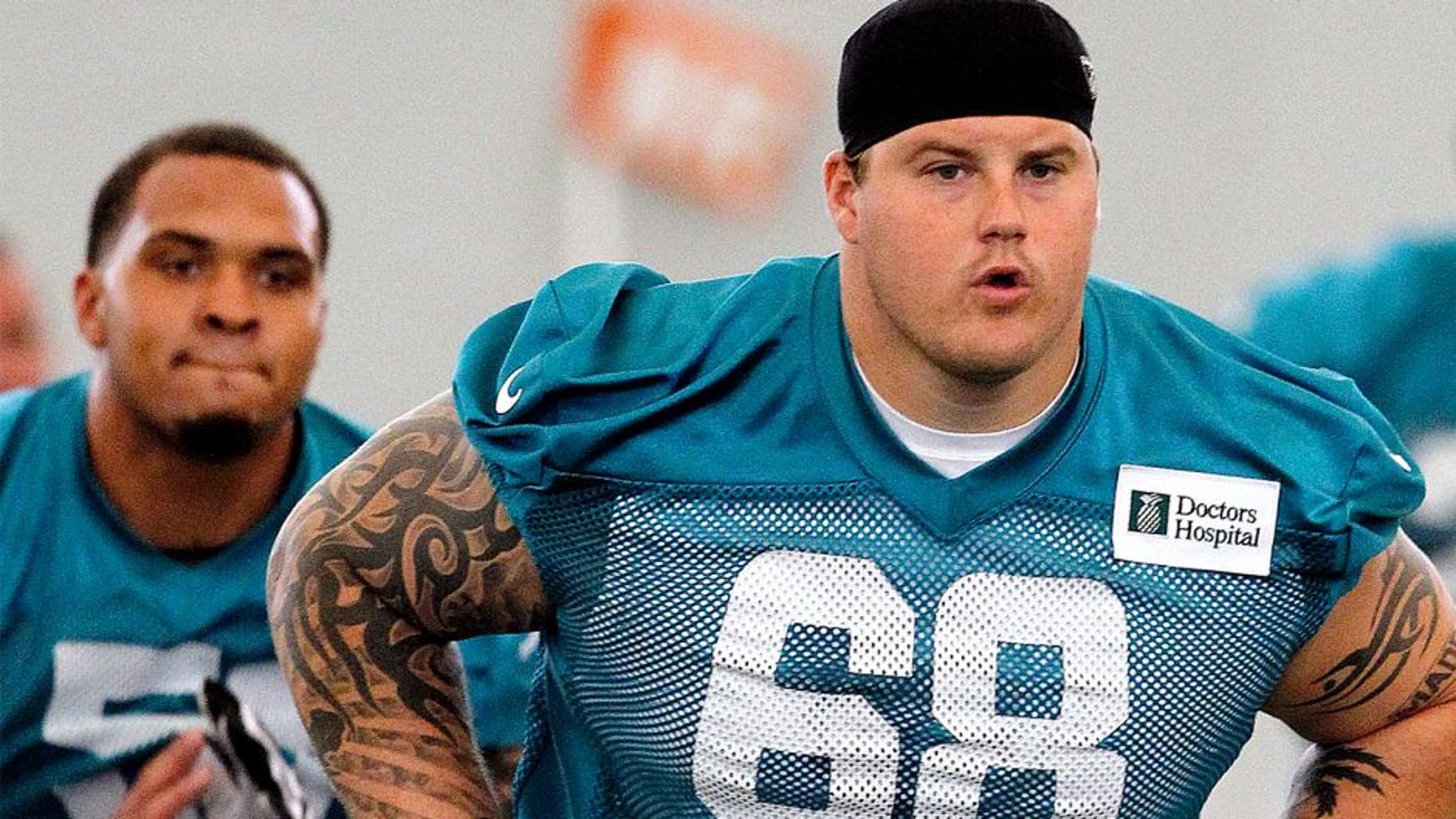 DAVIE, FL - MAY 21: Richie Incognito #68 of the Miami Dolphins runs a drill during the first team OTA on May 21, 2013 at the Miami Dolphins training facility in Davie, Florida. (Photo by Joel Auerbach/Getty Images)