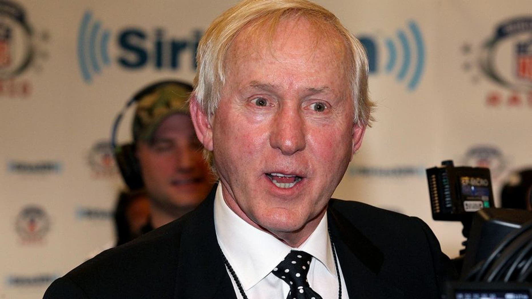 Feb 3, 2012; Indianapolis, IN, USA; NFL former quarterback Fran Tarkenton gives an interview on radio row for Super Bowl week. The New York Giants will play the New England Patriots in Super Bowl XLVI . Mandatory Credit: Matthew Emmons-USA TODAY Sports